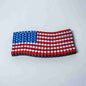 3D printed wavy American flag desk décor piece with rippled Stars and Stripes
Flappy American flag 3D print shown from an angle, highlighting the fluttering texture