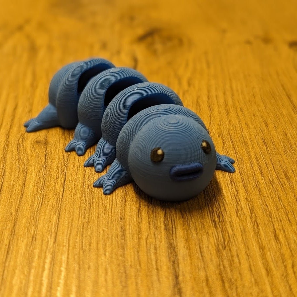 3D printed articulated tardigrade (water bear) keychain figure, top view