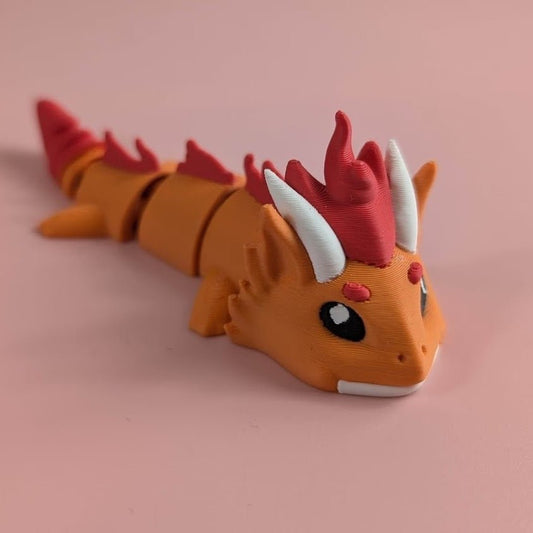 3D-printed Fire Dragon articulated flexi keychain, front view posed standing — 864 ToyLabs