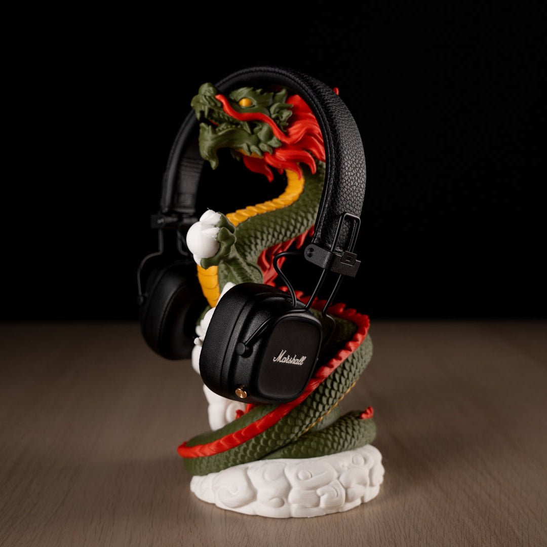 Marshall headphones on a dragon-shaped stand with a black background