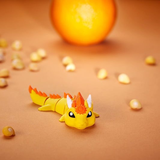 3D-printed Sun Dragon articulated flexi in warm sun-yellow, front view posed standing — 864 ToyLabs