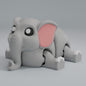 Articulated 3D printed Elephant figure with trunk and detailed textured skin
