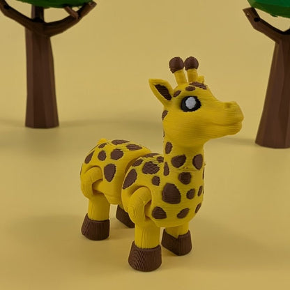 Articulated 3D printed Giraffe fidget keychain with spotted pattern and long neck
Front view of the Giraffe figure standing on a stone
