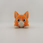 3D printed articulated flexi cat figure standing, side view
