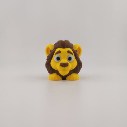 Articulated lion figure posed with body curved, showing flexible joints