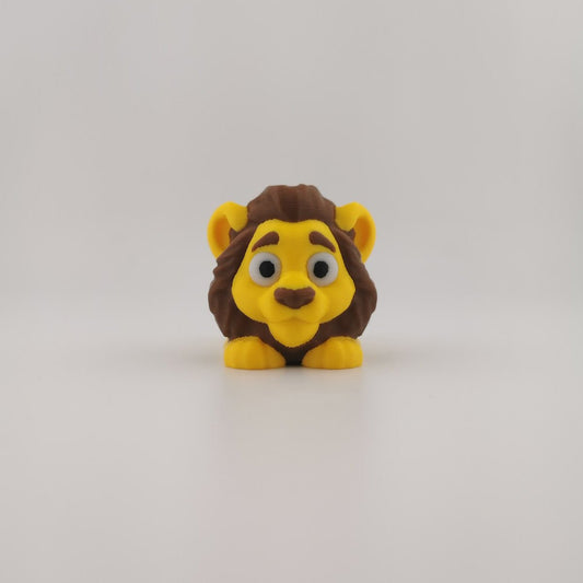 Articulated lion figure posed with body curved, showing flexible joints