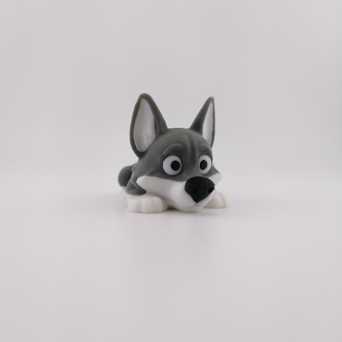 3D printed articulated wolf figure standing, full side profile