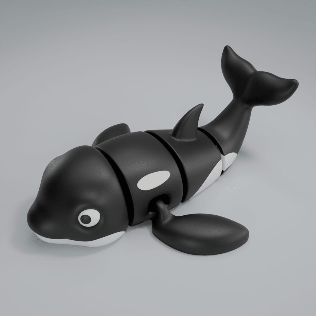 3D printed articulated orca whale figure, full side profile
Articulated orca figure posed mid-swim, flexible body extended
Orca figure showing black-and-white markings and dorsal fin
Close-up of articulated orca figure showing joints

