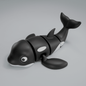3D printed articulated orca whale figure, full side profile
Articulated orca figure posed mid-swim, flexible body extended
Orca figure showing black-and-white markings and dorsal fin
Close-up of articulated orca figure showing joints

